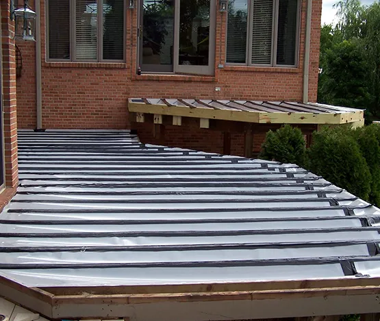 Under-deck waterproofing solution ensures a dry and protected space below.